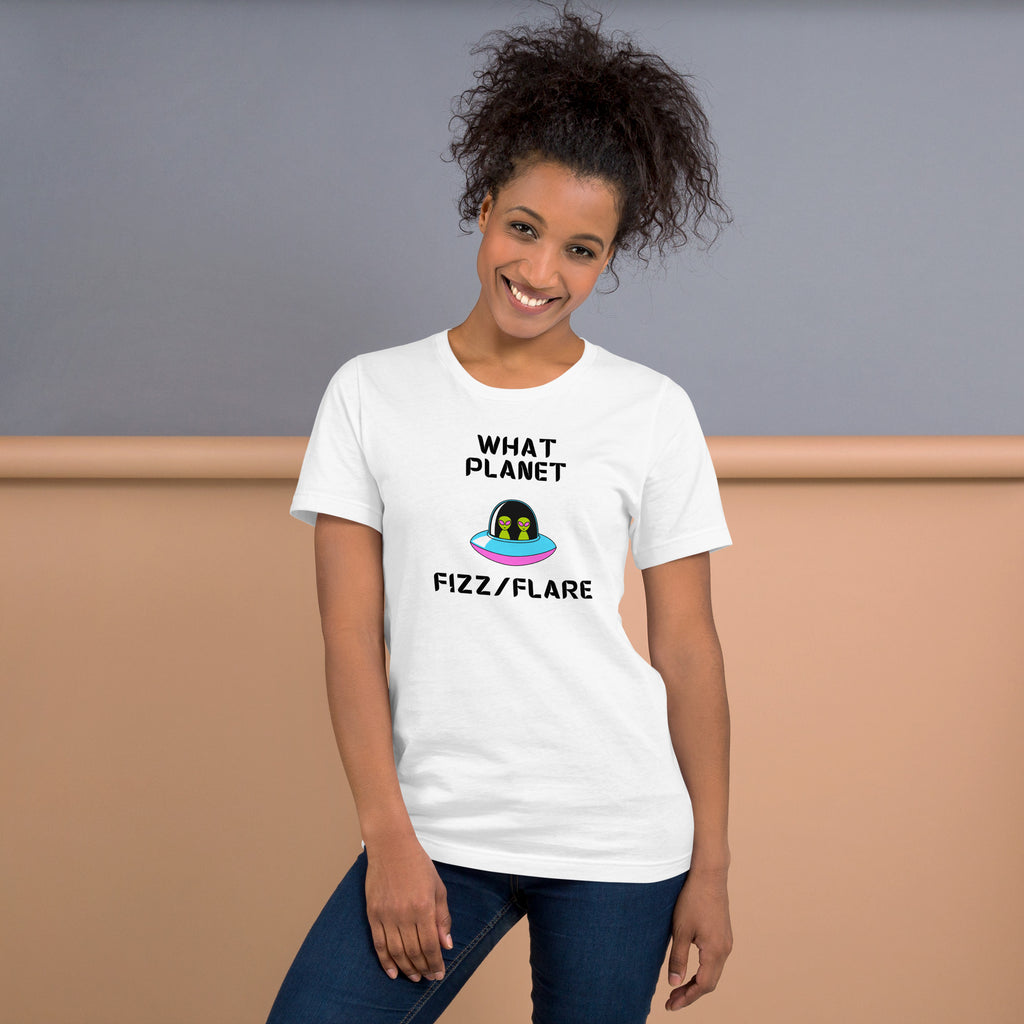 Unisex T shirt featuring a fun graphic design with the text "What Planet Fizz/Flare" on a model.