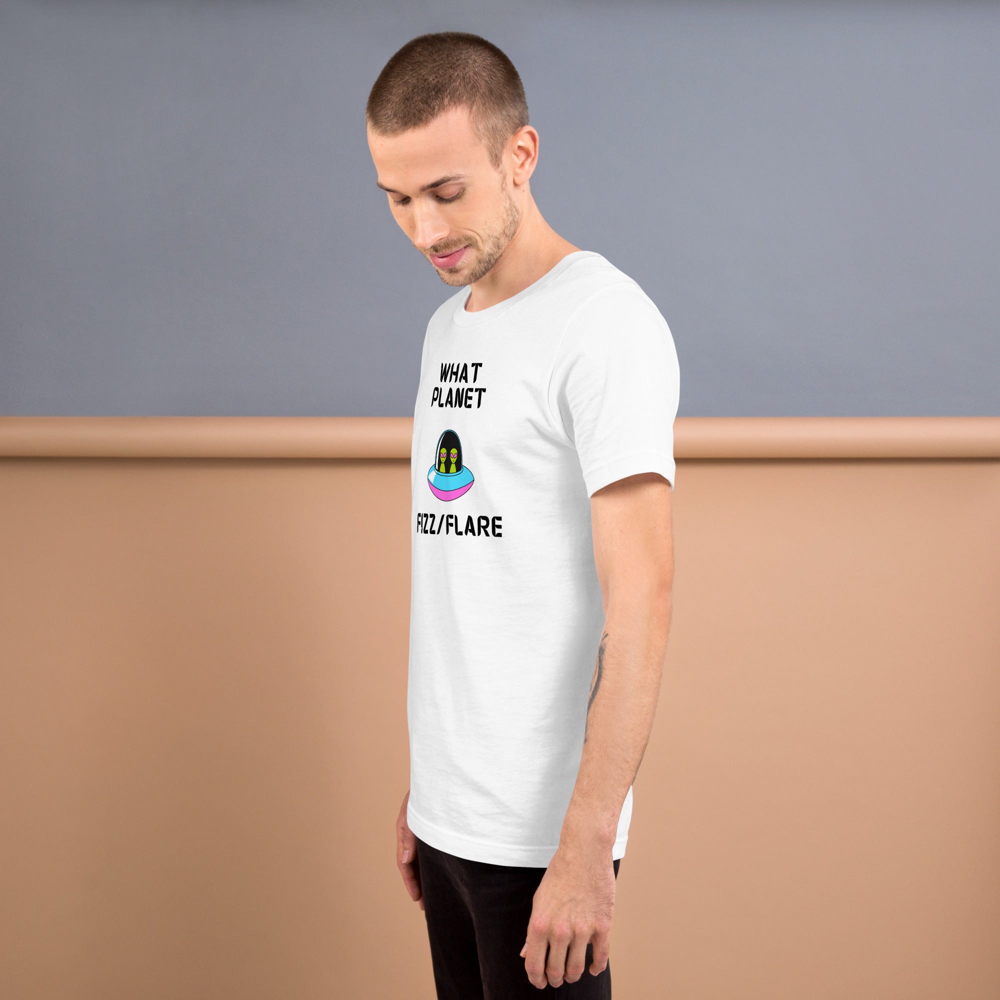 Unisex T shirt featuring a playful design with the text 'What Planet Fizz/Flare' for casual style.